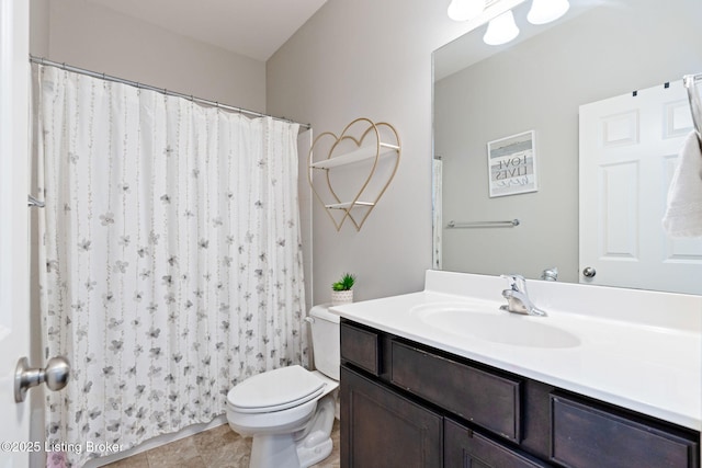 full bath with a shower with shower curtain, toilet, vanity, and tile patterned flooring