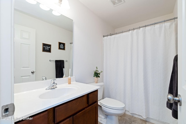 full bath featuring vanity, tile patterned floors, toilet, and visible vents