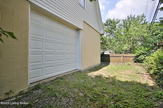 garage featuring fence