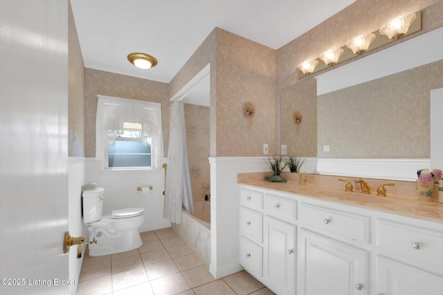 bathroom featuring shower / bathtub combination with curtain, toilet, wallpapered walls, tile patterned flooring, and vanity