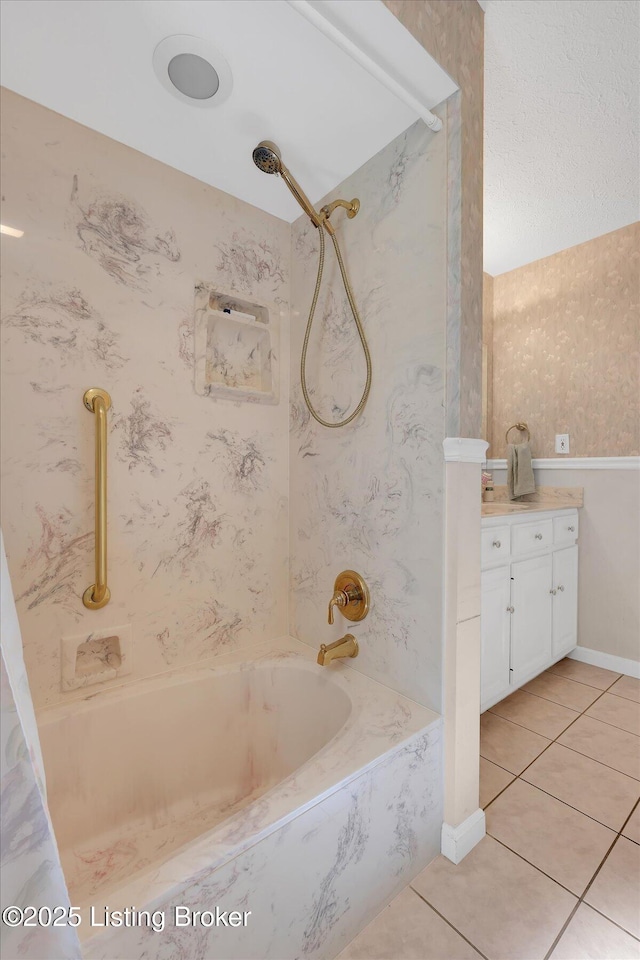 bathroom with tile patterned floors, vanity,  shower combination, and wallpapered walls