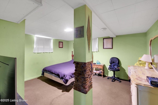 bedroom with baseboards and carpet floors