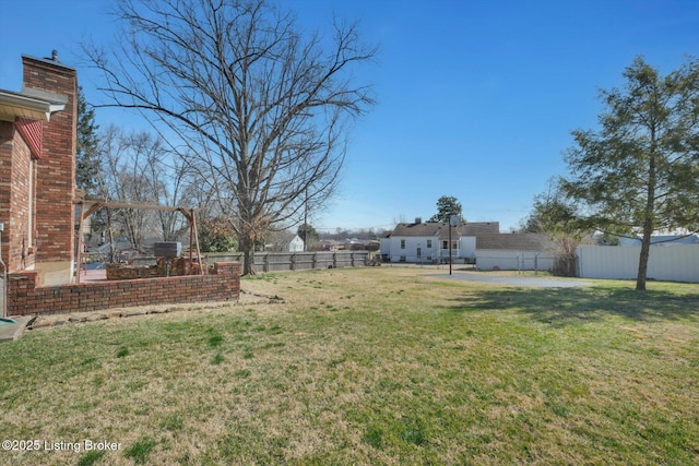 view of yard with a patio and fence