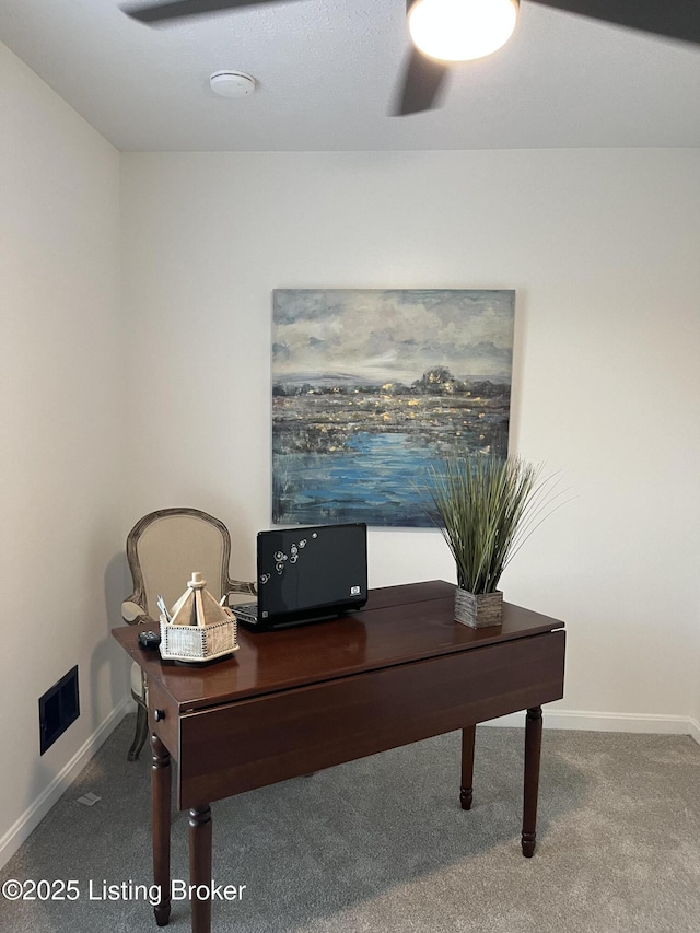 home office featuring baseboards and carpet floors