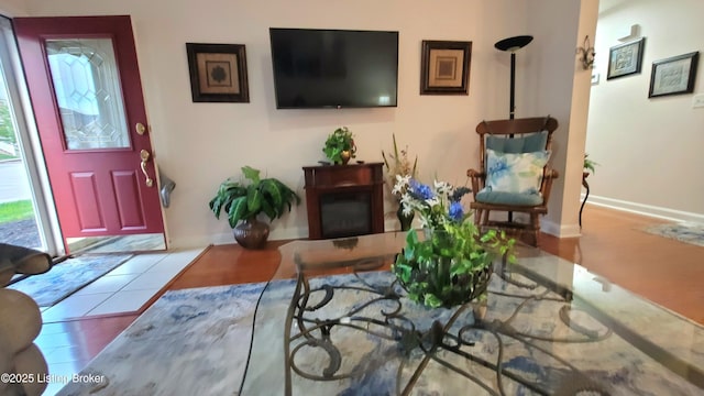 living room featuring baseboards