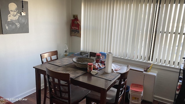 dining room with baseboards