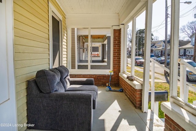 sunroom with a residential view