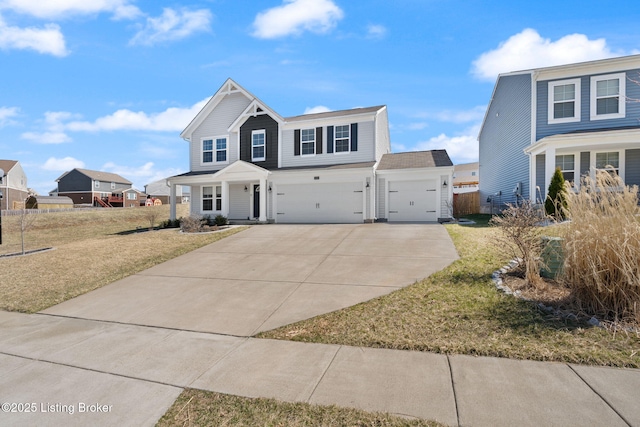 view of front facade with a garage, a front lawn, driveway, and fence