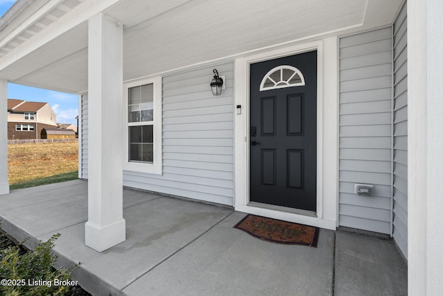 doorway to property with a porch