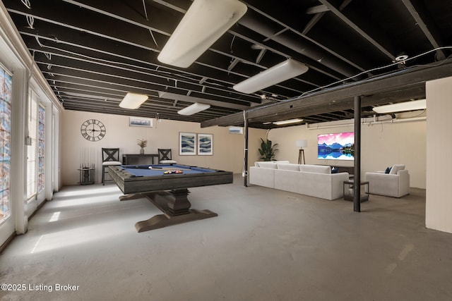 playroom with concrete flooring and billiards