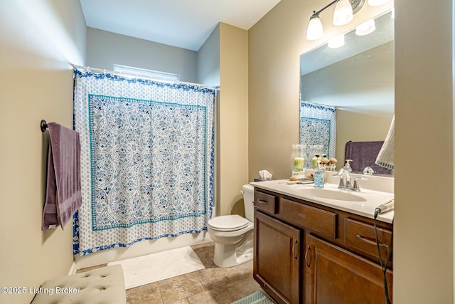 full bathroom featuring vanity, toilet, and shower / bath combo with shower curtain