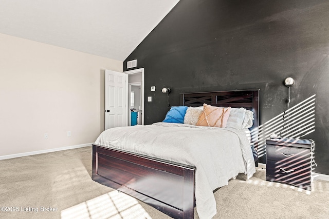 carpeted bedroom with visible vents, baseboards, and vaulted ceiling