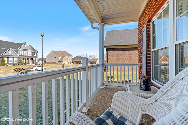 balcony featuring a residential view