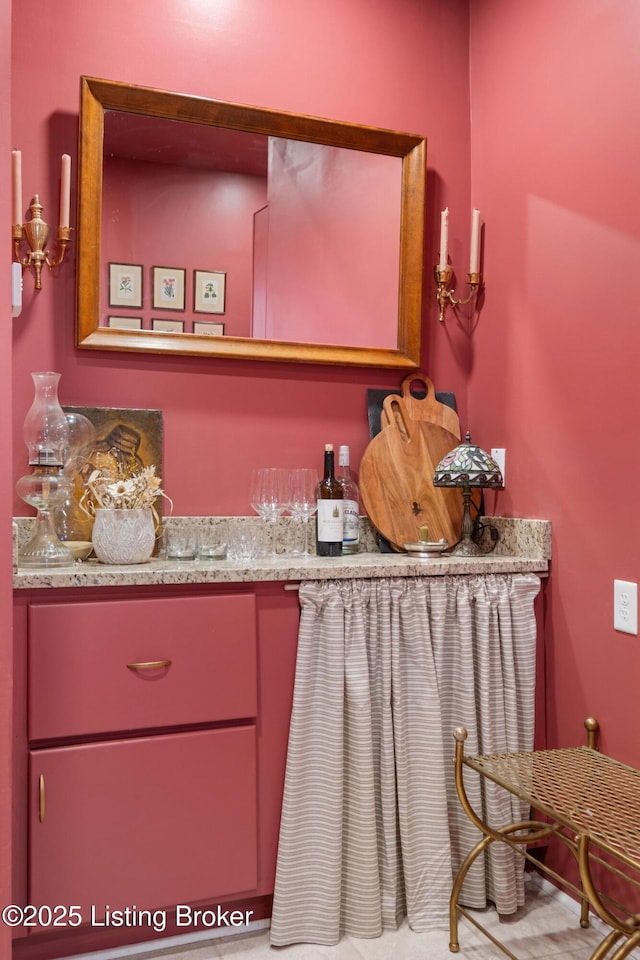 kitchen featuring red cabinets