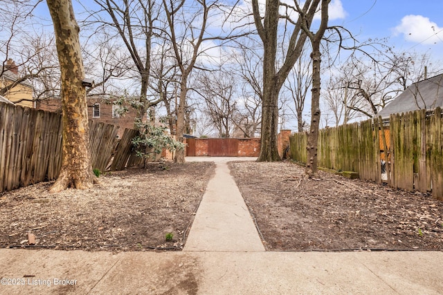 view of yard featuring a fenced backyard