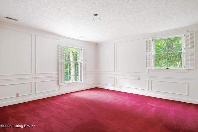 602 Club Ln, Louisville, KY 40207 - carpeted spare room with a decorative wall and a textured ceiling