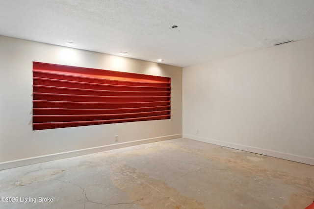 602 Club Ln, Louisville, KY 40207 - empty room with unfinished concrete flooring and a textured ceiling