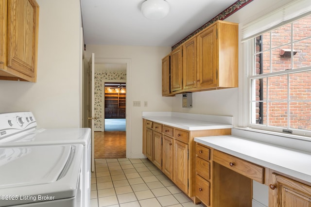602 Club Ln, Louisville, KY 40207 - washroom featuring cabinet space, separate washer and dryer, and light tile patterned floors