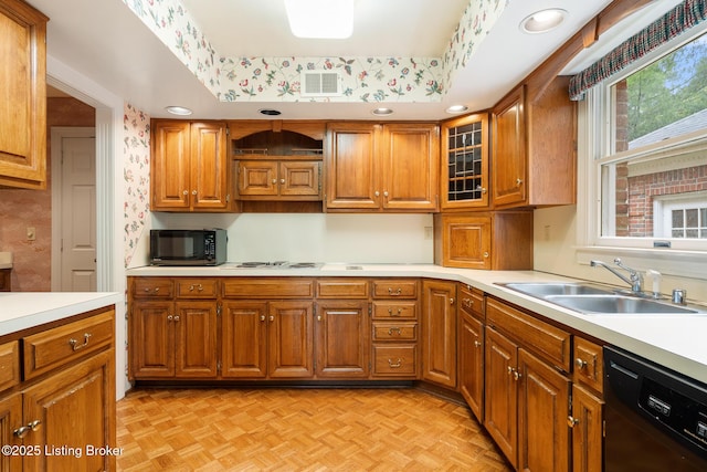 602 Club Ln, Louisville, KY 40207 - kitchen featuring black appliances, light countertops, and brown cabinets
