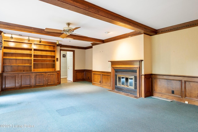 602 Club Ln, Louisville, KY 40207 - unfurnished living room featuring a wainscoted wall, ornamental molding, carpet floors, a fireplace with flush hearth, and beamed ceiling