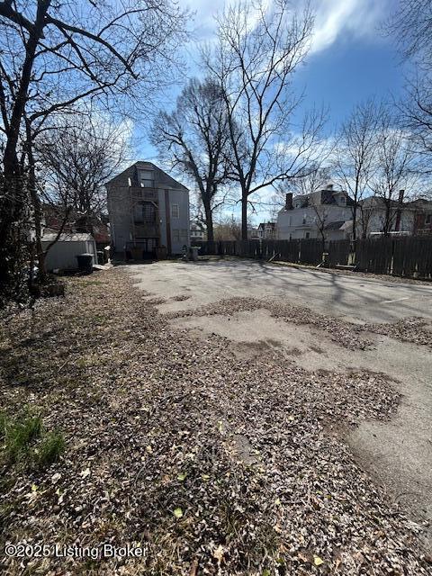 view of yard featuring fence