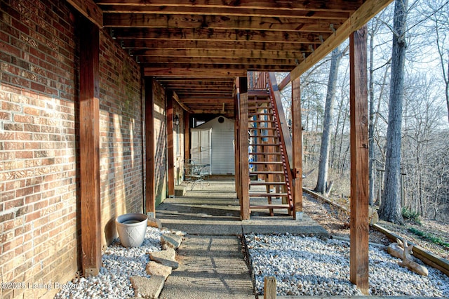 view of patio / terrace with stairway