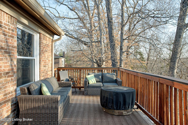 wooden deck with an outdoor hangout area