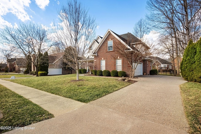 traditional-style home with a front yard, a garage, brick siding, and concrete driveway