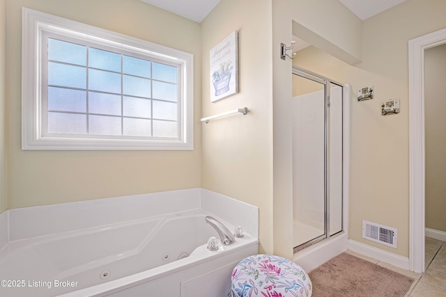 bathroom featuring tile patterned floors, visible vents, a whirlpool tub, and a shower stall