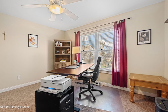 home office with ceiling fan, carpet, and baseboards