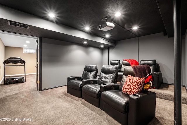 carpeted cinema featuring recessed lighting and visible vents