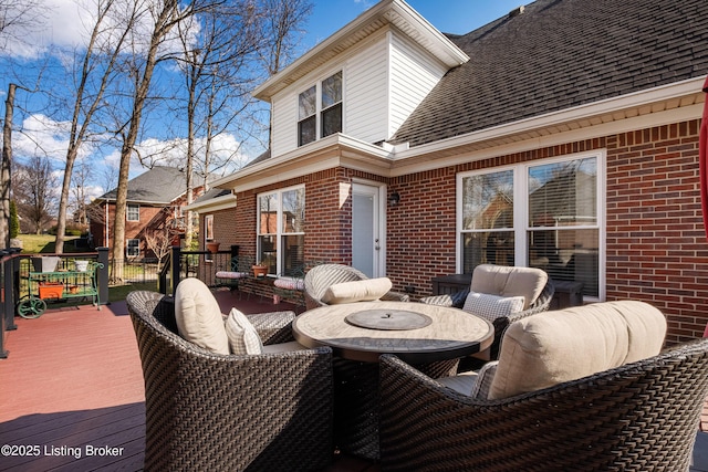 wooden deck with outdoor dining area