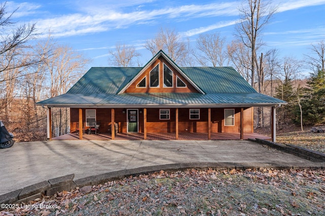 view of front of home with metal roof and covered porch