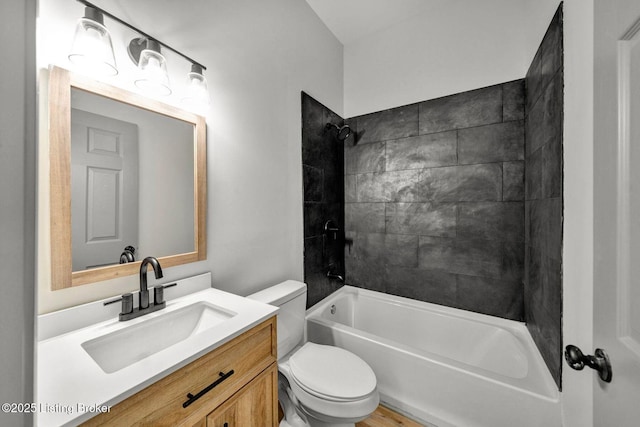 bathroom featuring vanity,  shower combination, and toilet