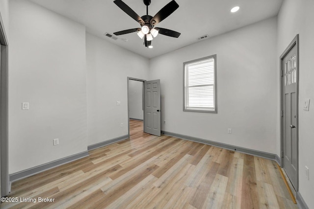 unfurnished bedroom with recessed lighting, light wood-style floors, visible vents, and baseboards