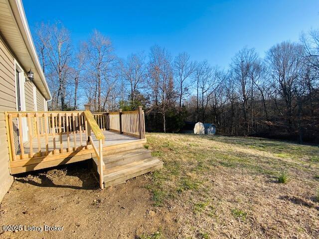 view of yard with a deck