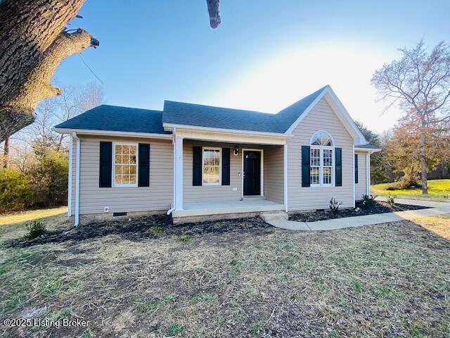 single story home featuring a shingled roof, a porch, a front lawn, and crawl space