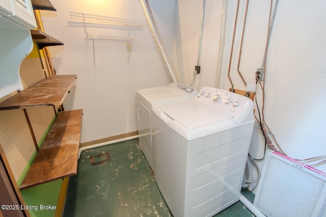 laundry room featuring independent washer and dryer and laundry area