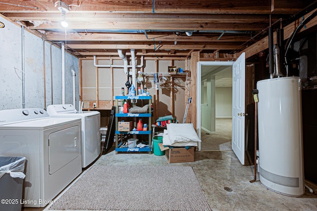 unfinished basement with washer and clothes dryer and gas water heater