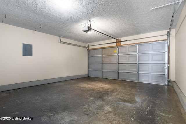 garage featuring electric panel, a garage door opener, and baseboards