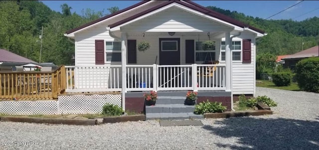 bungalow-style house featuring covered porch