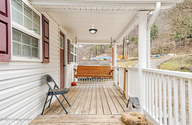 wooden deck with a porch