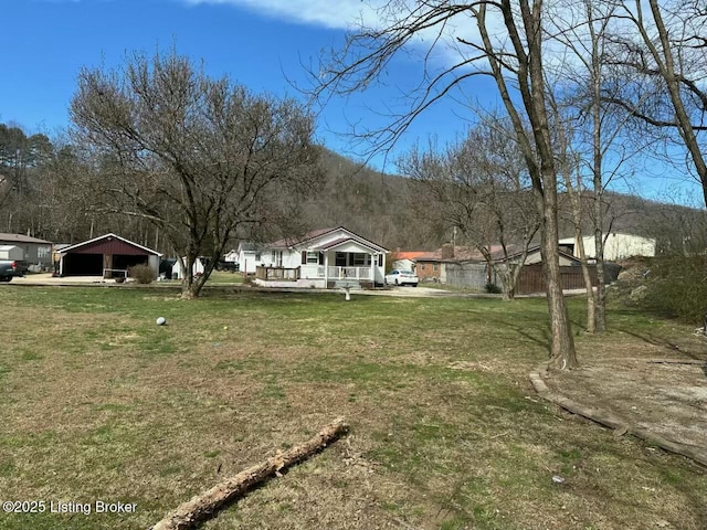 view of yard featuring a carport