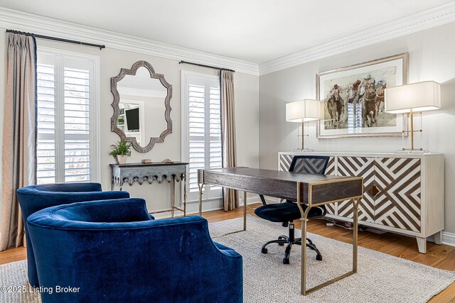 office with wood finished floors and crown molding