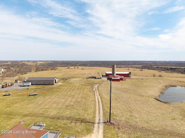 bird's eye view with a rural view and a water view