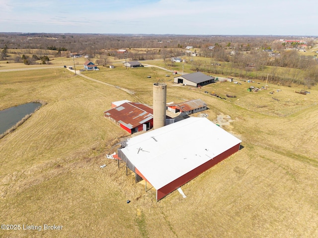 birds eye view of property with a rural view