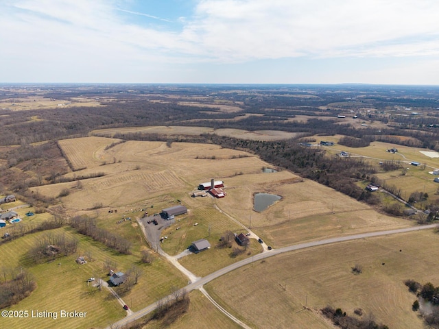 birds eye view of property featuring a rural view