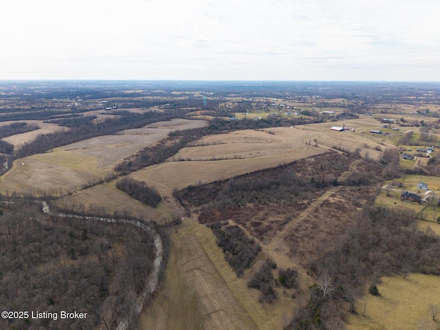 birds eye view of property with a rural view