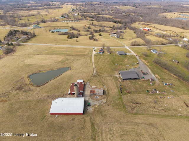 drone / aerial view with a rural view and a water view