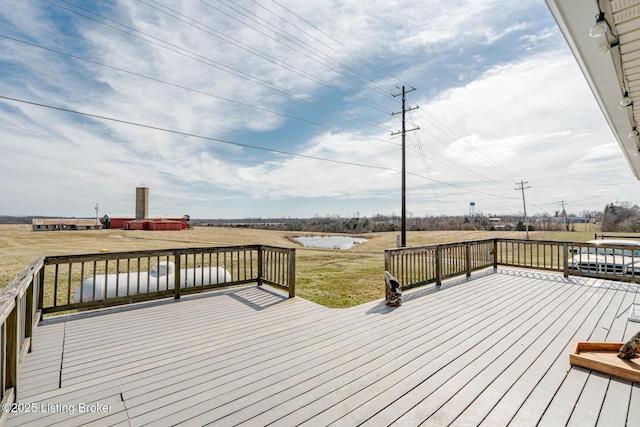 deck featuring a lawn